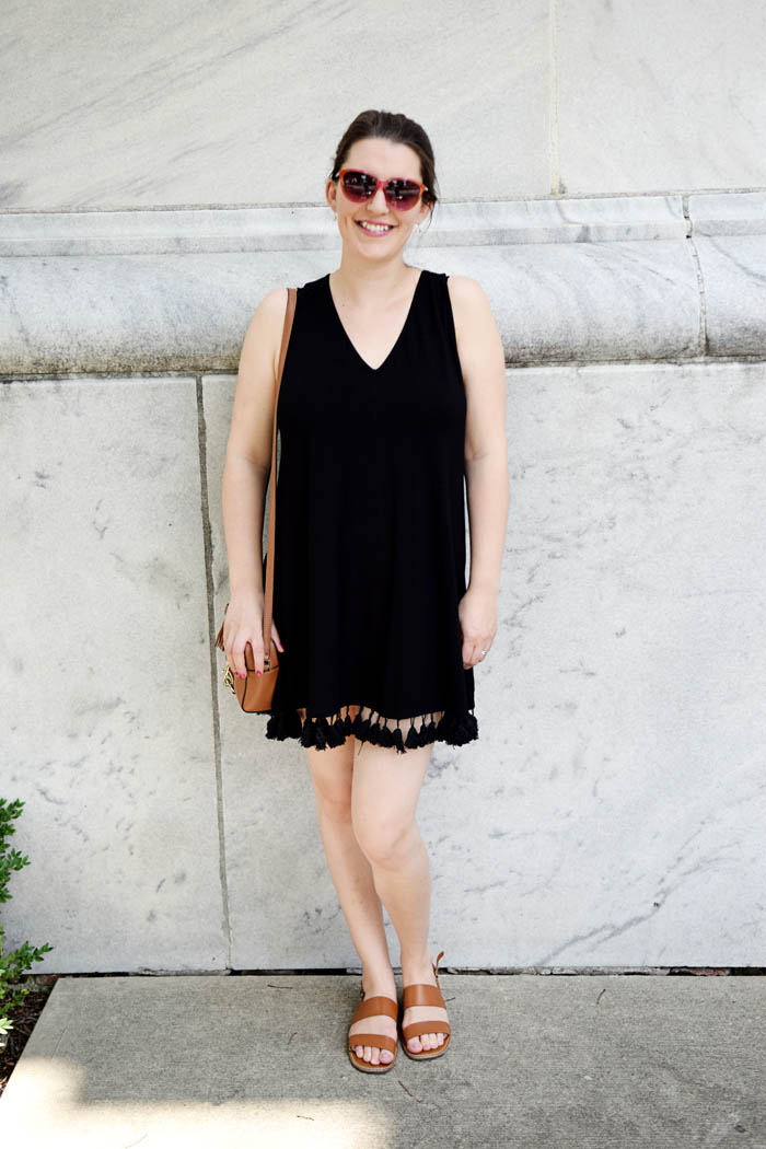 This black tassel dress is perfect for hot summer days. Get the full look on AnExplorersHeart.com