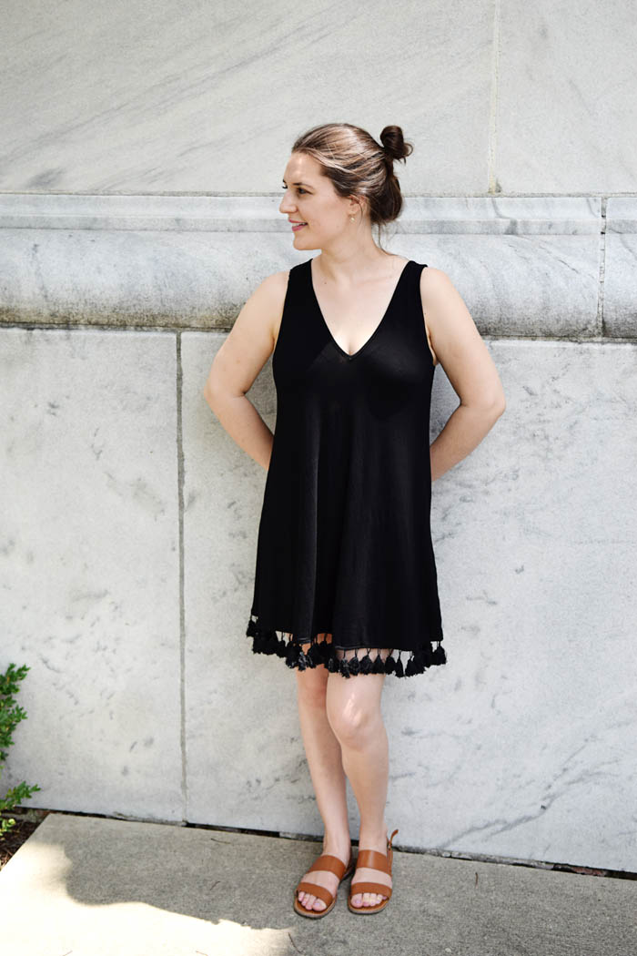This black tassel dress is perfect for hot summer days. Get the full look on AnExplorersHeart.com