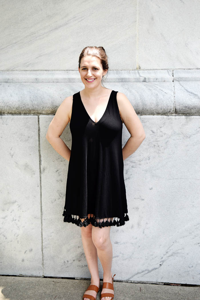 This black tassel dress is perfect for hot summer days. Get the full look on AnExplorersHeart.com